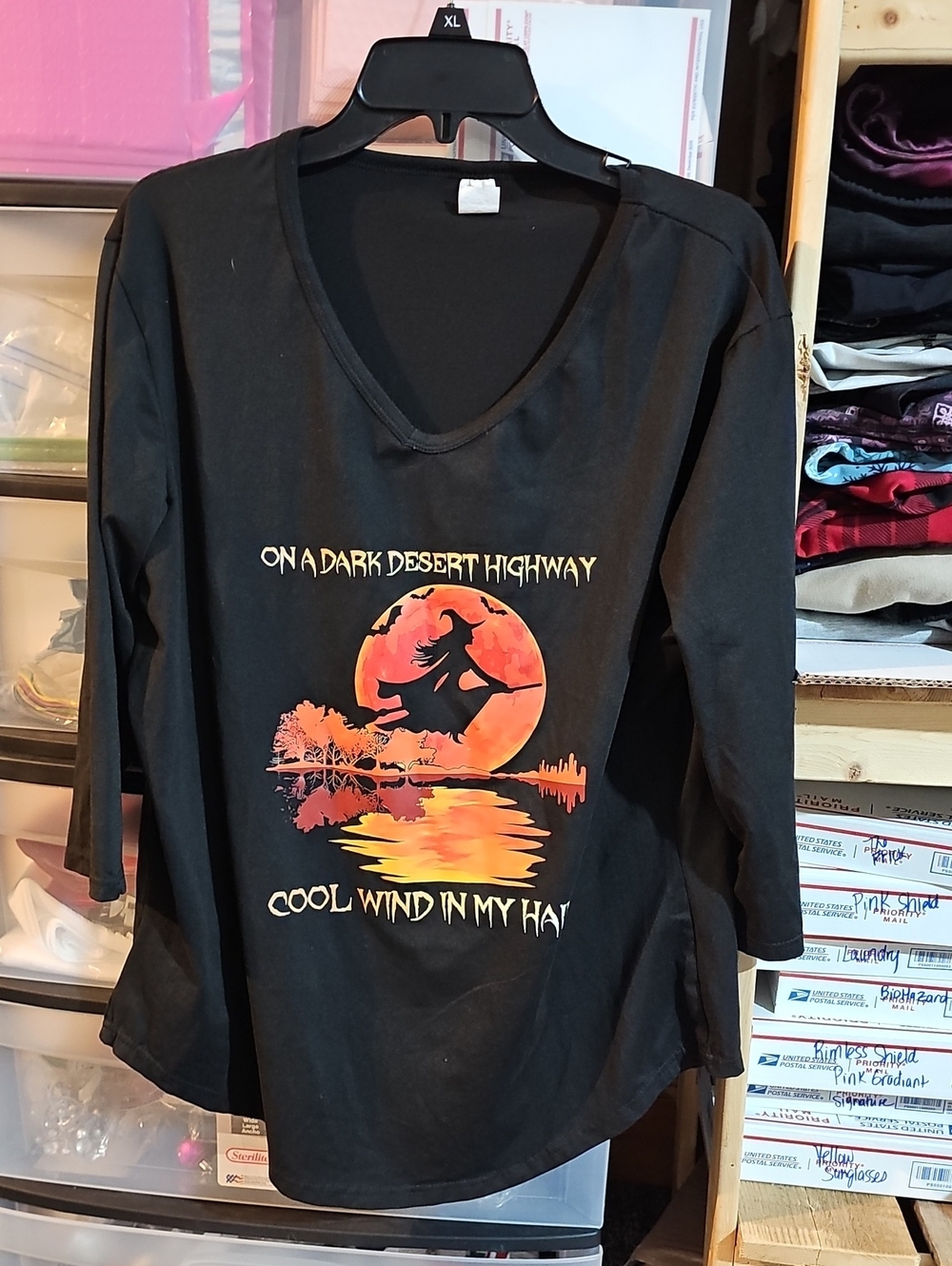 Women’s Black Long-Sleeve V-Neck Tee with Orange Graphic Moon